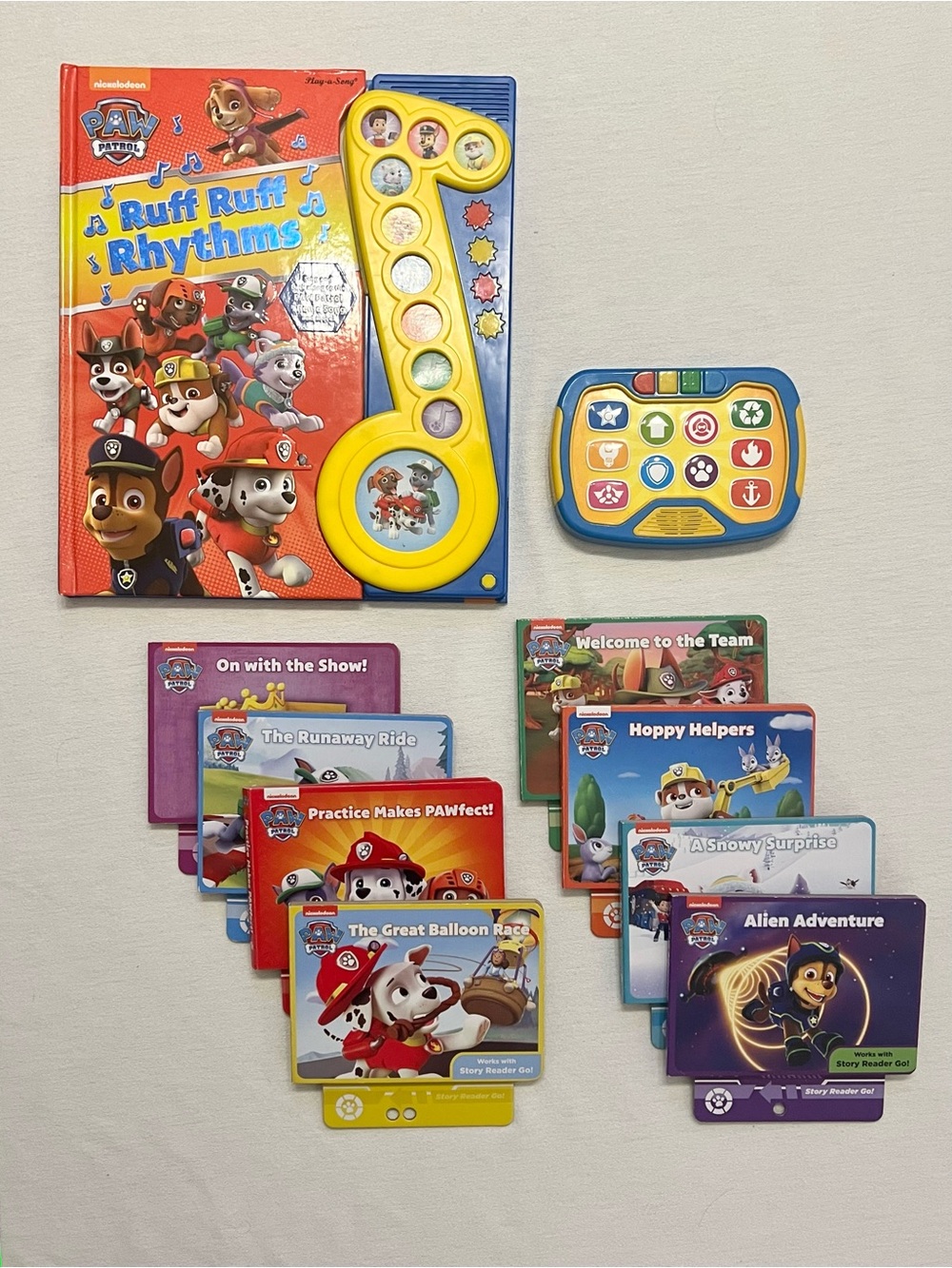 Paw Patrol Story Reader Go + Ruff Ruff Rhythms Interactive Book Bundle